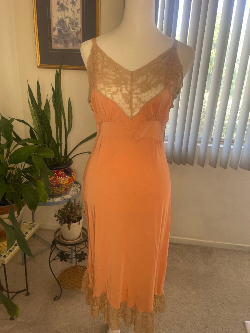 VINTAGE: 1940'S Bur-Mil midrif slip in size 34 is one of a kind. Peach/rose hue.